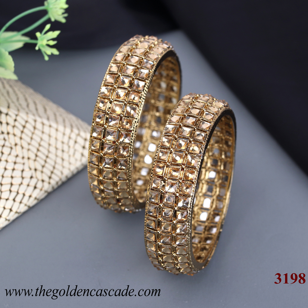 Fancy Golden Plated Design with Stone Studded American Diamond Metal Kada / Bangles for women (AD-3198)